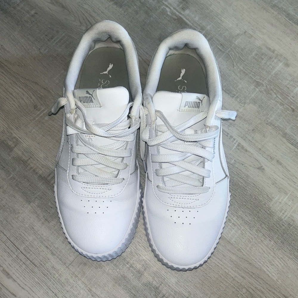 All white PUMA’s in size 10.